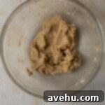 Pure Banana Indulgence Cupcakes 4 Butter and sugar creamed in a glass bowl.