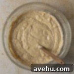 Pure Banana Indulgence Cupcakes 5 Banana cupcake batter in a glass bowl.