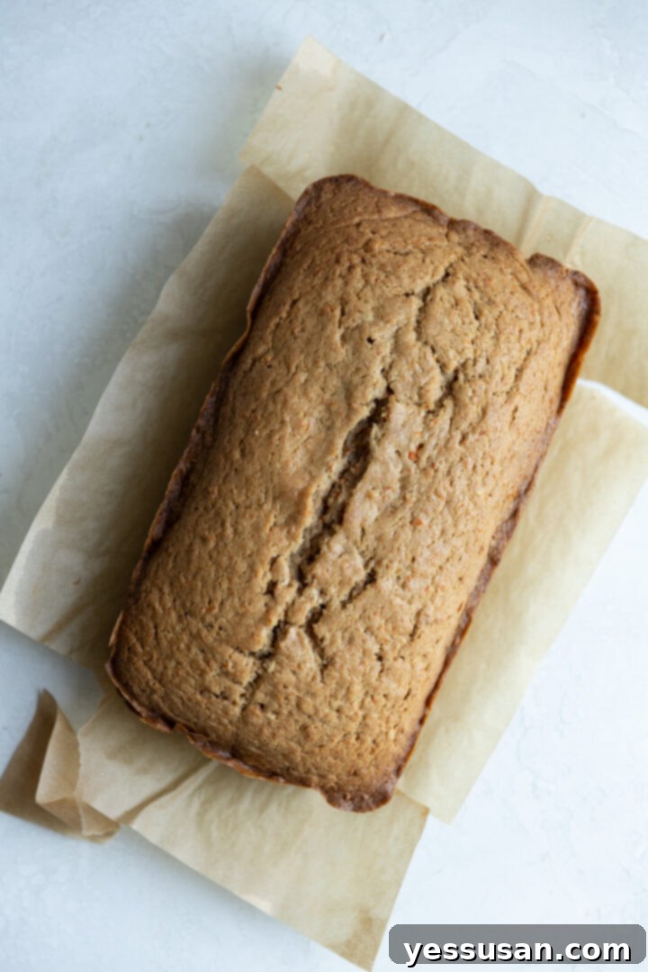Moist Carrot Loaf: Simple Baking Perfection 8 A perfectly baked carrot cake loaf, golden brown and ready to enjoy.